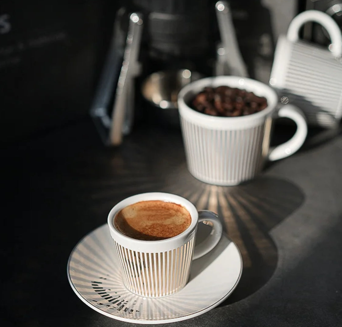 Bewegende In-Motion Tasse