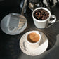 Bewegende In-Motion Tasse