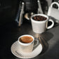 Bewegende In-Motion Tasse